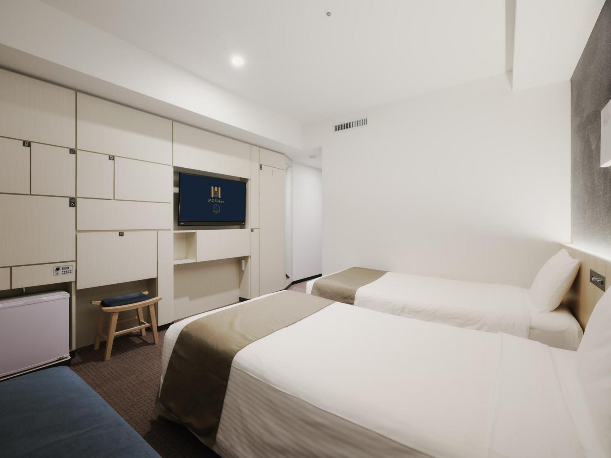 Corner Twin Room with Sofa Bed